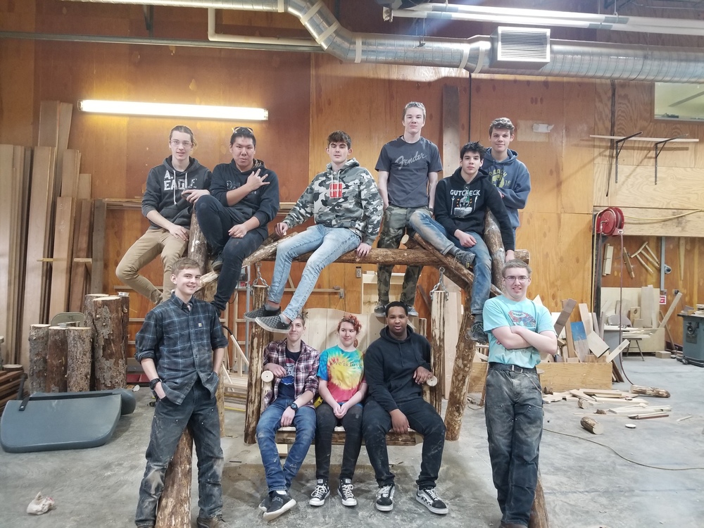 Kids hanging out in wood shop