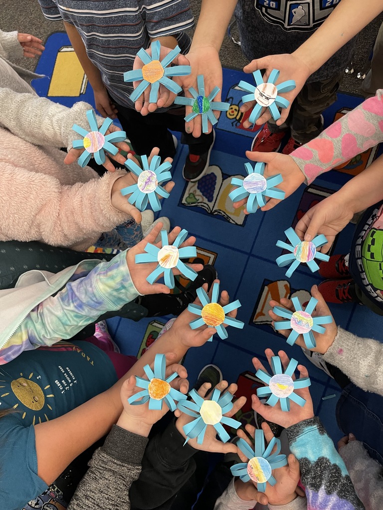 Turquoise flowers by second grade.